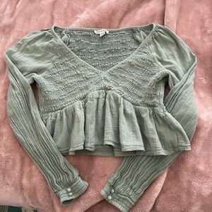 Springy shirt haha stretchy and cute, just not my style. Worn once or twice!